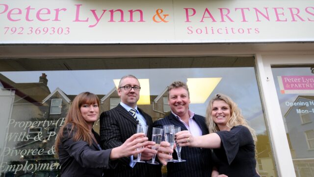 Peter Lynn and staff celebrate Mumbles 1st Year Anniversary