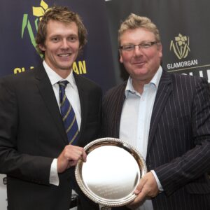 Star bowler receives award from leading Swansea solicitor