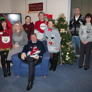 Staff at leading law firm don their Christmas jumpers to raise funds for children’s charities